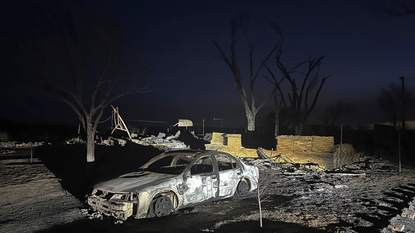 Charred homes, blackened earth after Texas town revisited by destructive wildfire 10 years later