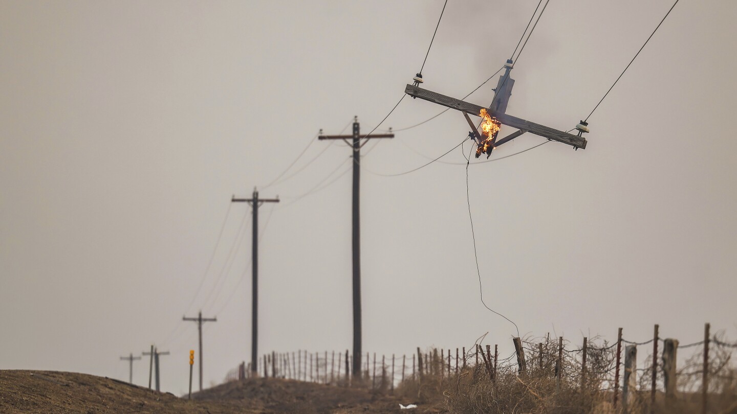 Firefighters seek to corral massive Texas wildfires before weekend of higher temperatures and winds