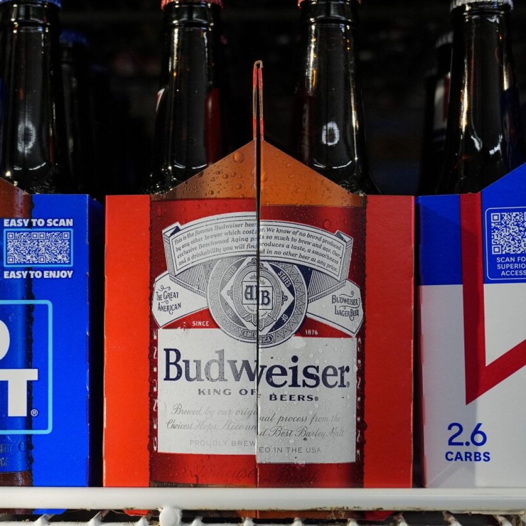 Beer maker Anheuser-Busch InBev sees operating profits rise for 2023 despite backlash over Bud Light