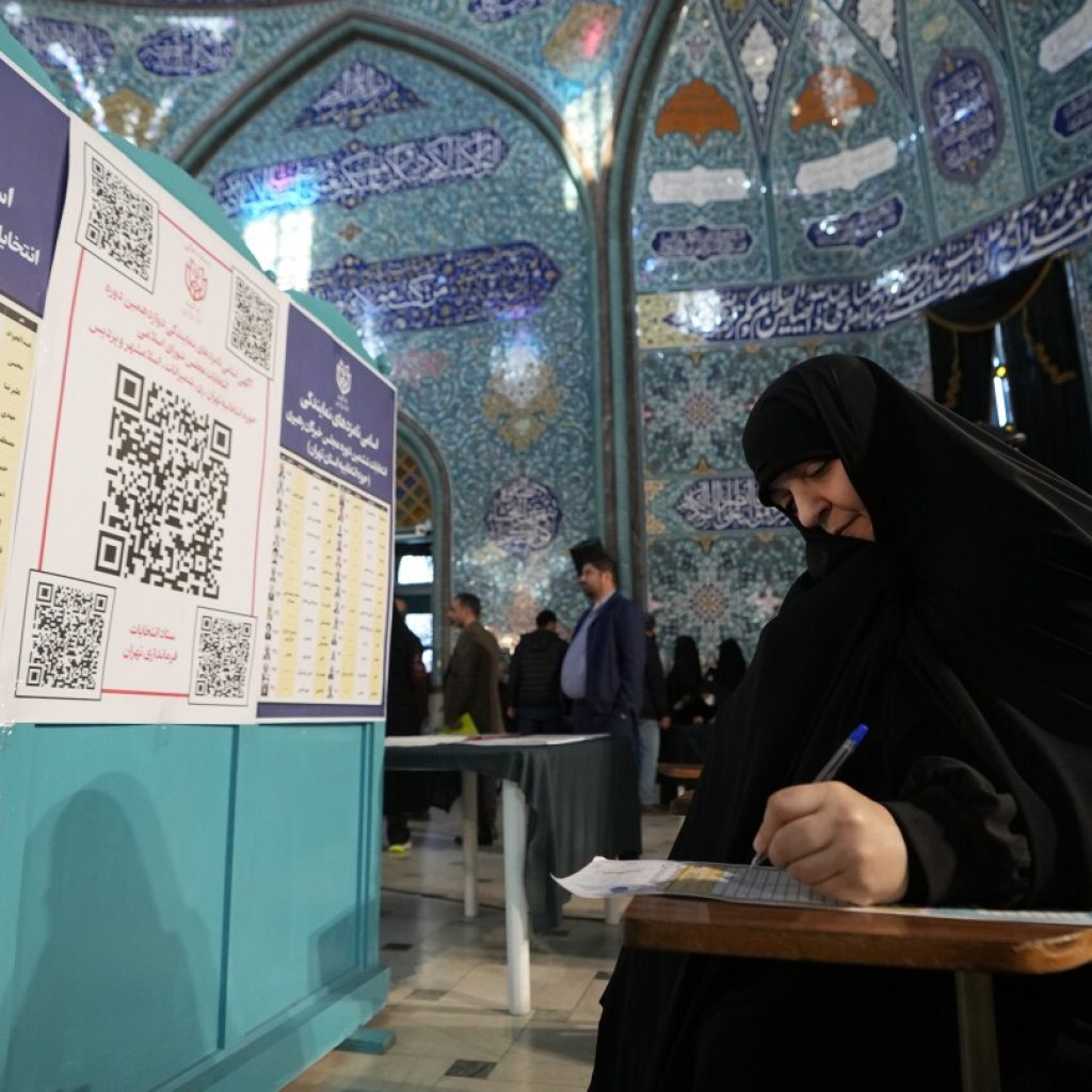 Iran begins voting in first parliament election since 2022 protests as questions over turnout loom