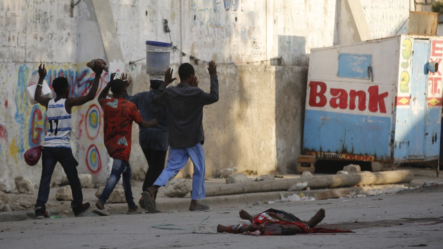 Haitian police spokesman says new gang attacks overwhelmed officers: ‘The city center was at war’