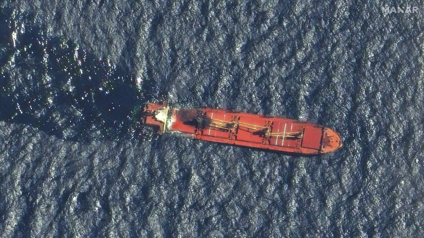 A ship earlier hit by Yemen’s Houthi rebels sinks in the Red Sea, the first vessel lost in conflict