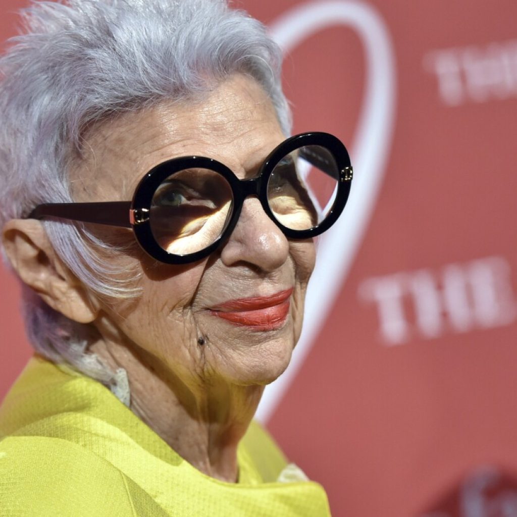 Iris Apfel, fashion icon known for her eye-catching style, dies at 102