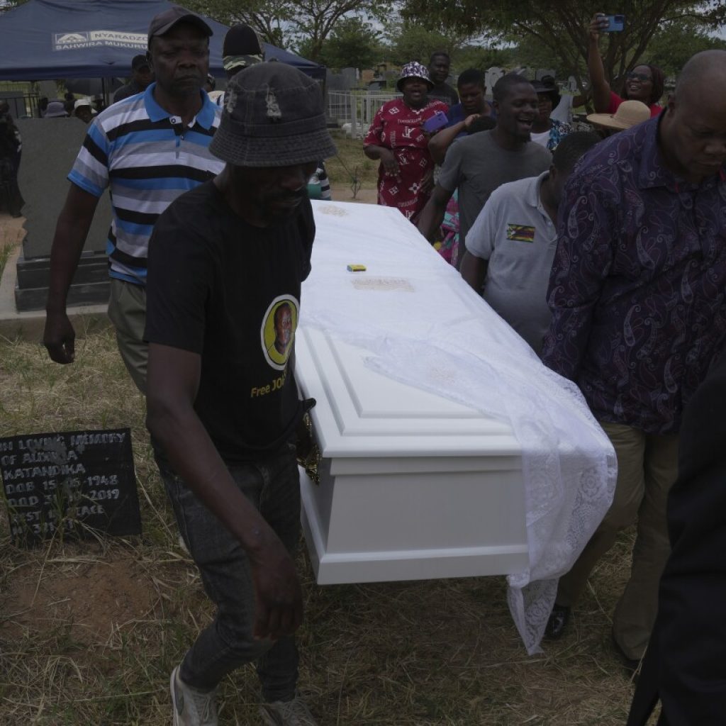 At the funeral of a slain Zimbabwean activist, clashes and a low turnout mirror opposition decline