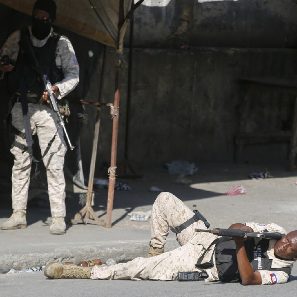 Hundreds of inmates flee after armed gangs storm Haiti’s main prison, leaving bodies behind