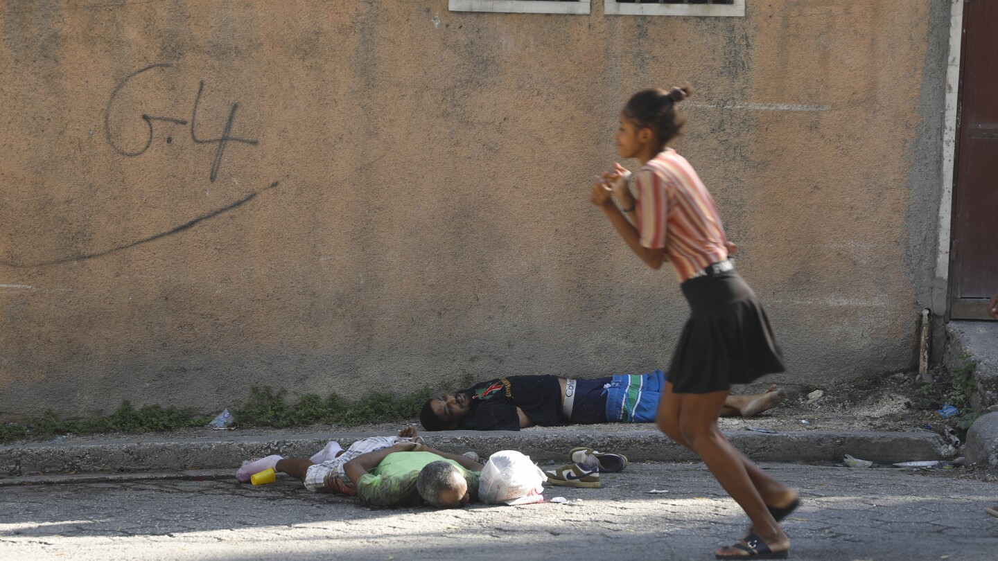 Haiti orders nightly curfew trying to restore calm after a weekend of violence and prison break