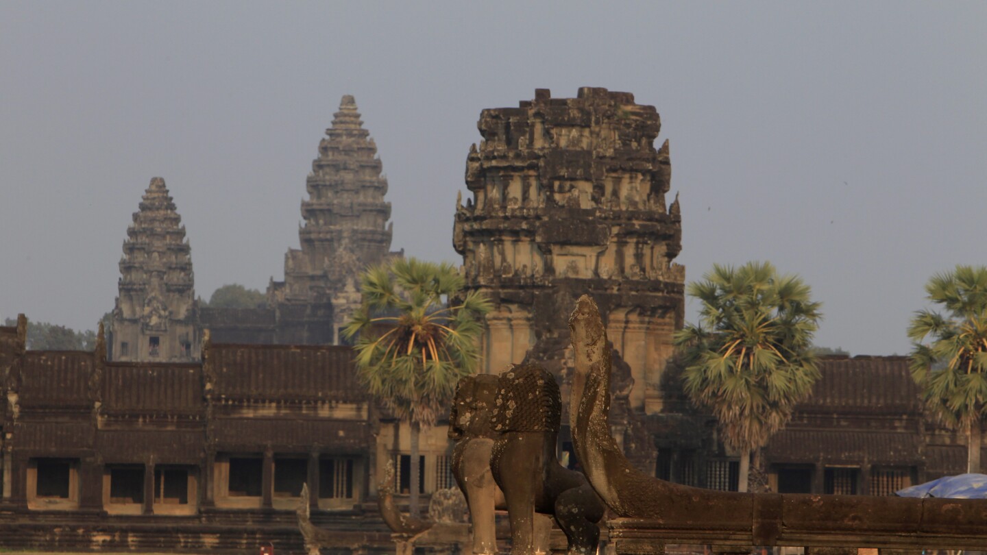 Cambodia defends family relocations around the famous Angkor Wat temple complex