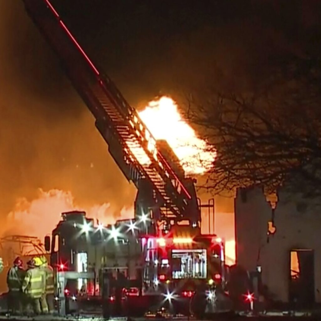 Industrial fire and multiple explosions shoot debris into the air in Detroit suburb