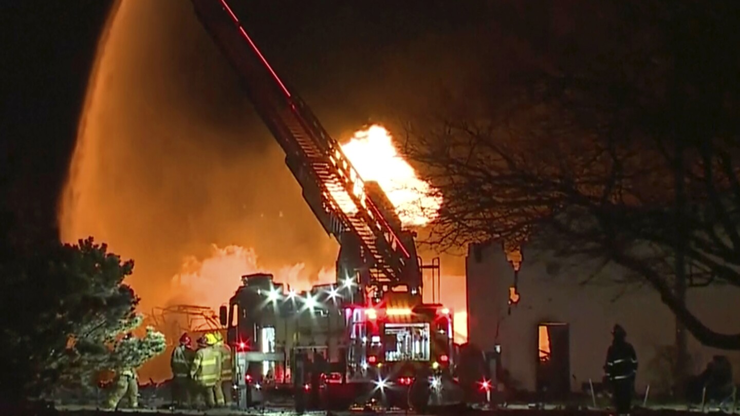 Industrial fire and multiple explosions shoot debris into the air in Detroit suburb