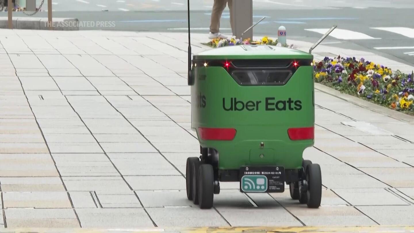 Uber Eats launches robot delivery service in Tokyo | AP News