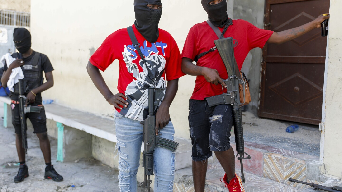 Politicians seek new alliances to lead Haiti as gangs take over and premier tries to return home