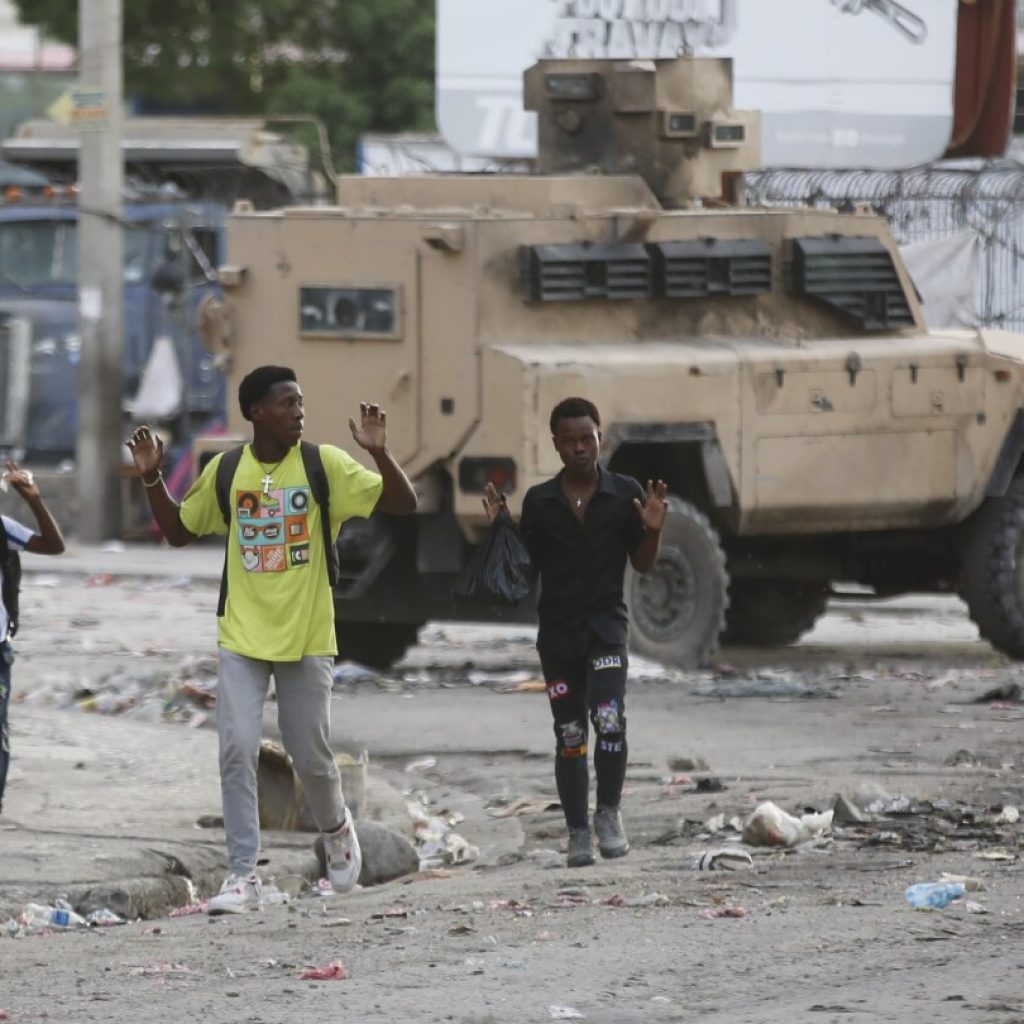 AP PHOTOS: Civilians navigate bodies in the streets amid violence gripping Haiti’s capital