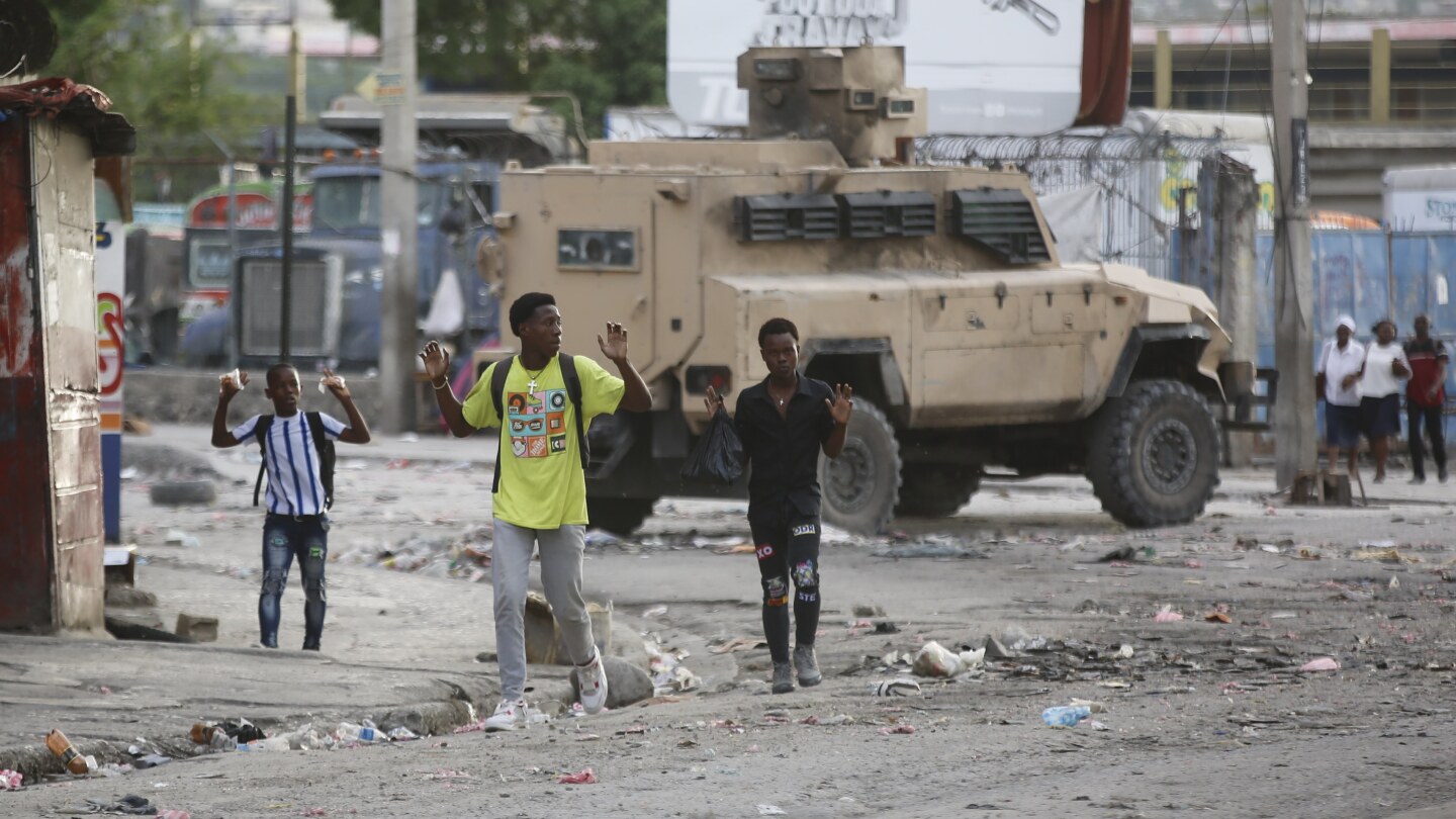 AP PHOTOS: Civilians navigate bodies in the streets amid violence gripping Haiti’s capital