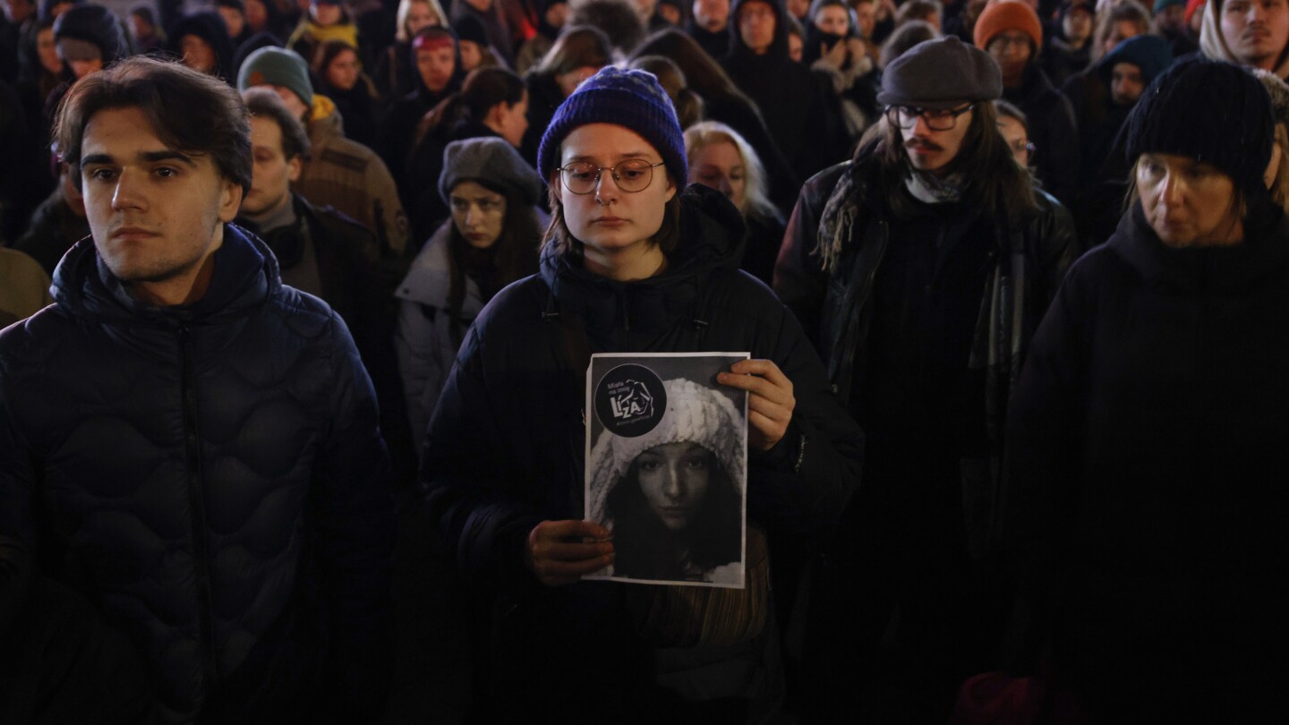 Mourners honor woman who was raped and killed in Poland’s capital after fleeing Belarus