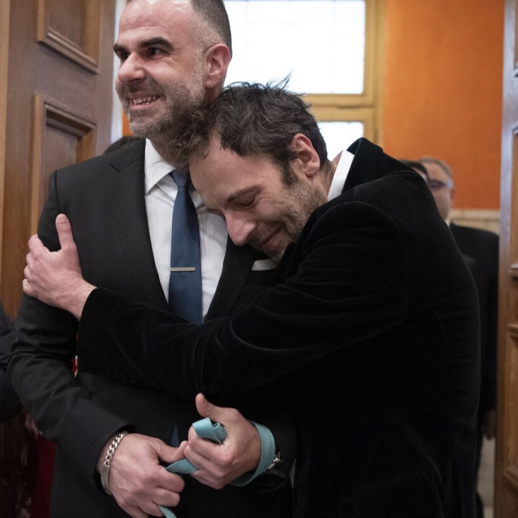 In rights landmark, Greek novelist and lawyer are the first same-sex couple wed at Athens city hall