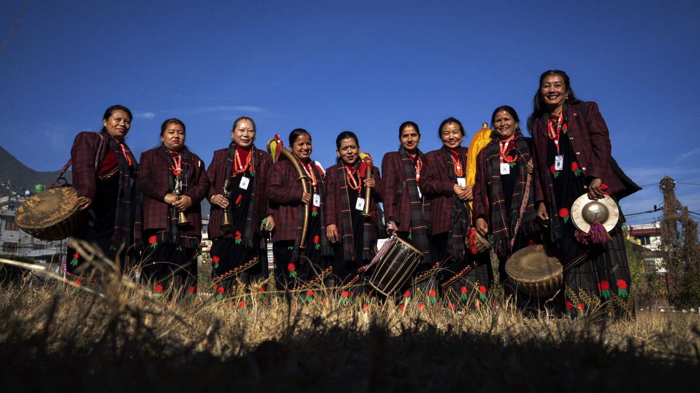 AP PHOTOS: Nepal women keep the art of traditional instruments alive despite their past stigma