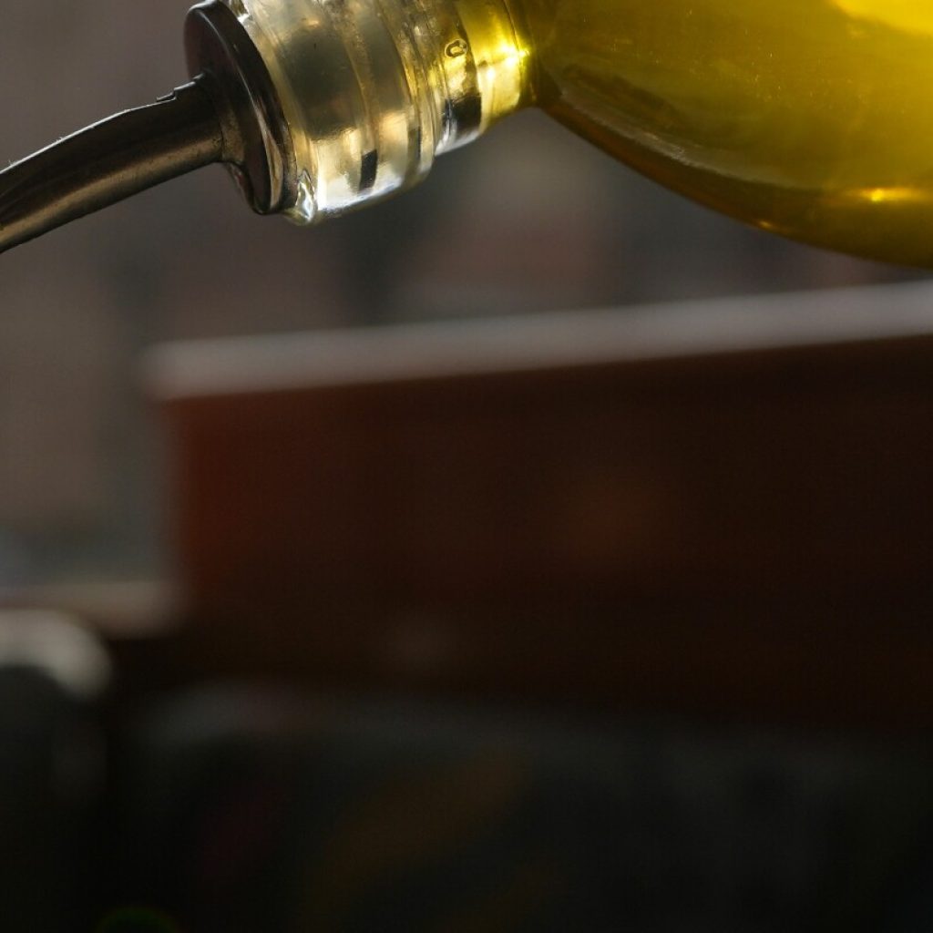 Italians cut back on olive oil as prices surge, survey says. Producers are pushing back on that