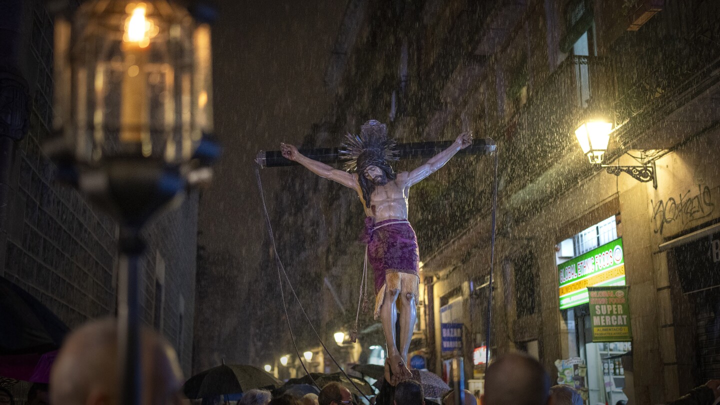 A religious procession in Barcelona celebrates rain during a severe drought in northeast Spain