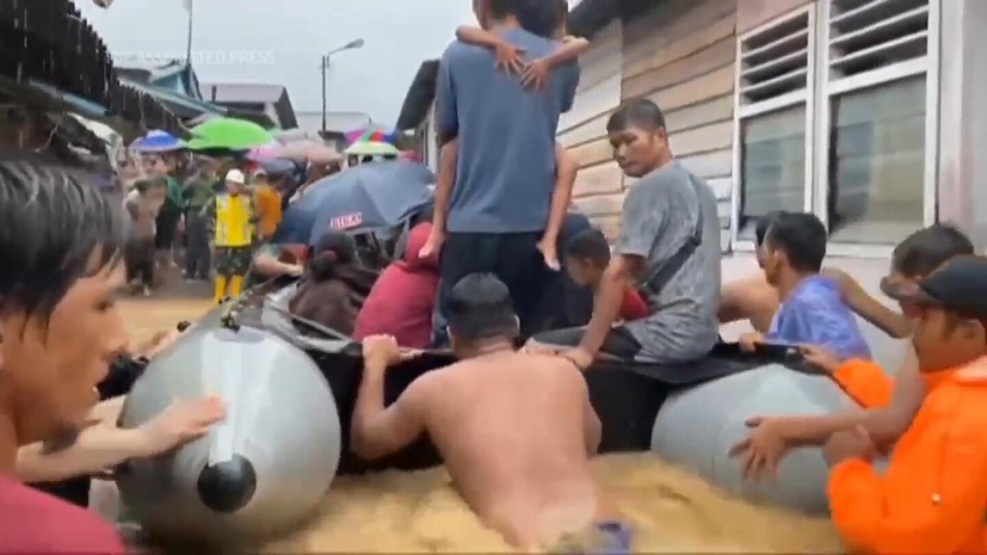 Search for missing continues after deadly landslide and flash floods hit Indonesia’s Sumatra island | AP News