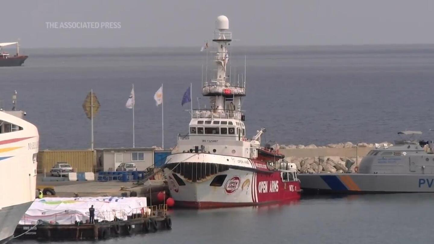 Aid ship still anchored in Cyprus port ahead of pilot voyage to test Gaza sea corridor | AP News