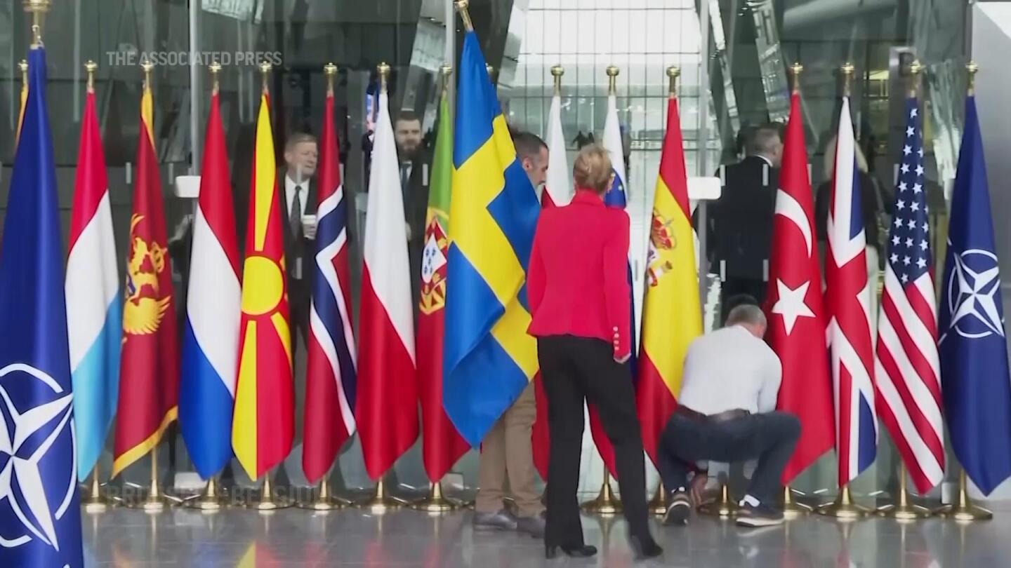 Sweden’s flag is raised at NATO headquarters to cement its place as the 32nd member of the alliance | AP News