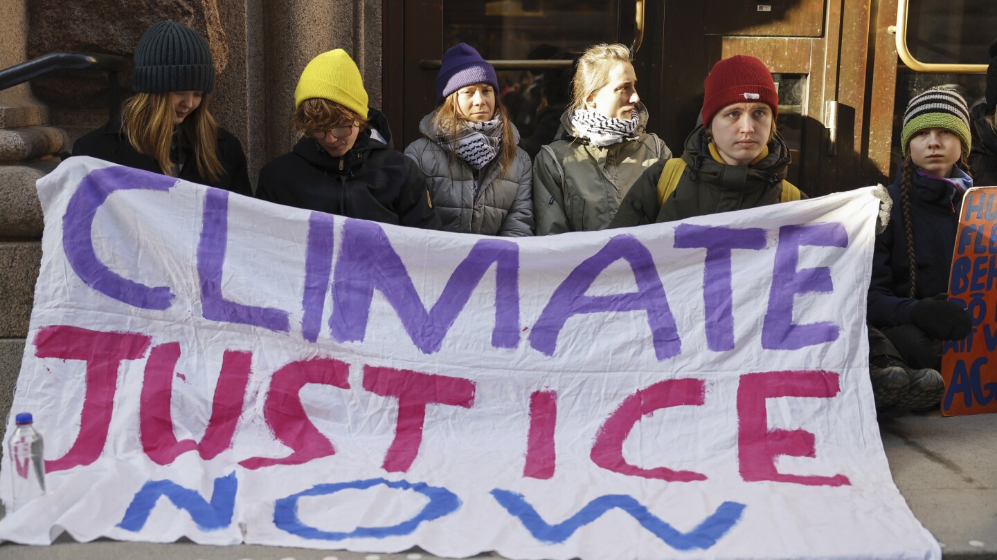 Greta Thunberg leads climate protesters in blockade at Swedish parliament | AP News