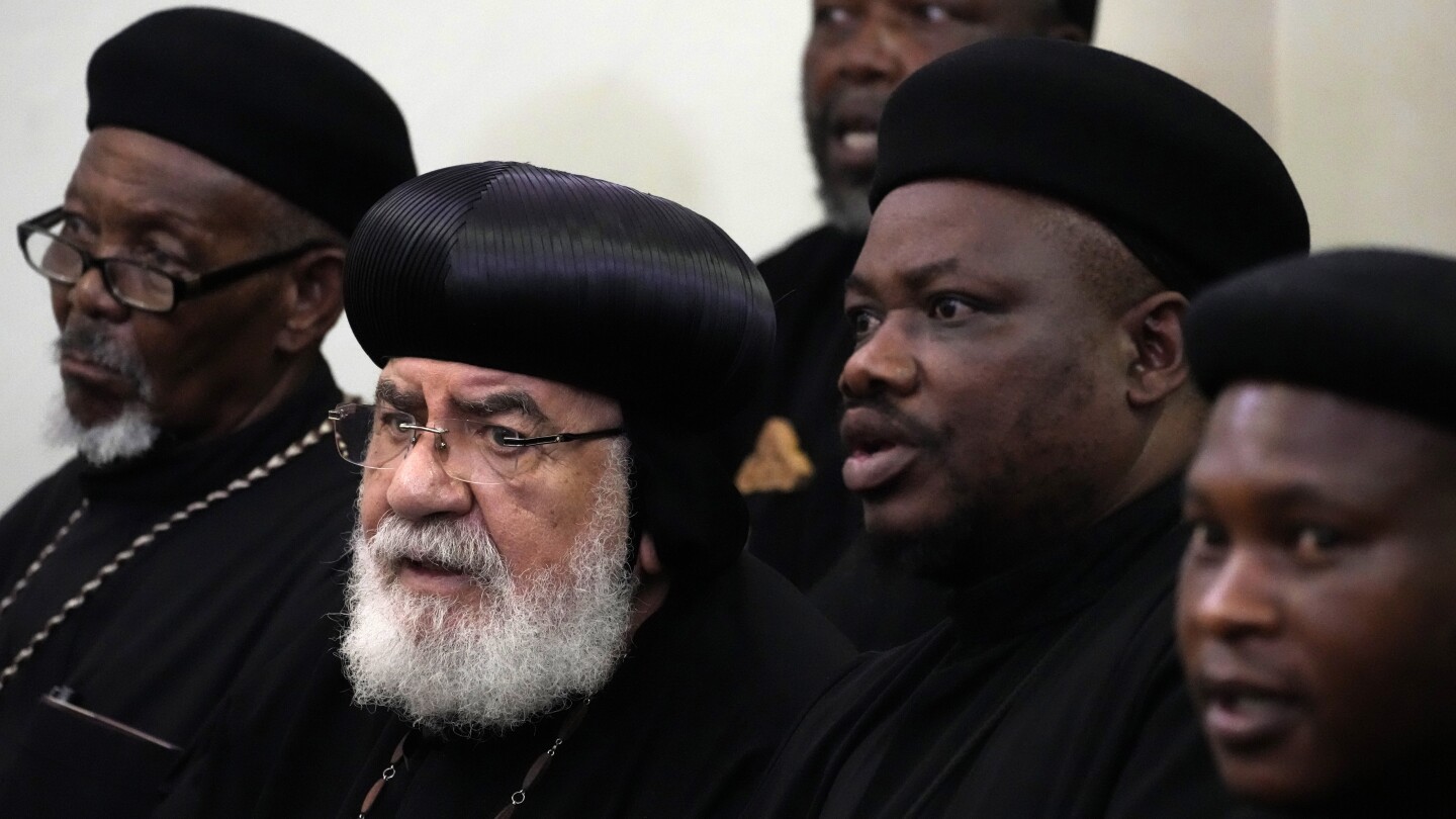 2 men accused of murdering 3 Egyptian Coptic monks appear in a South African court