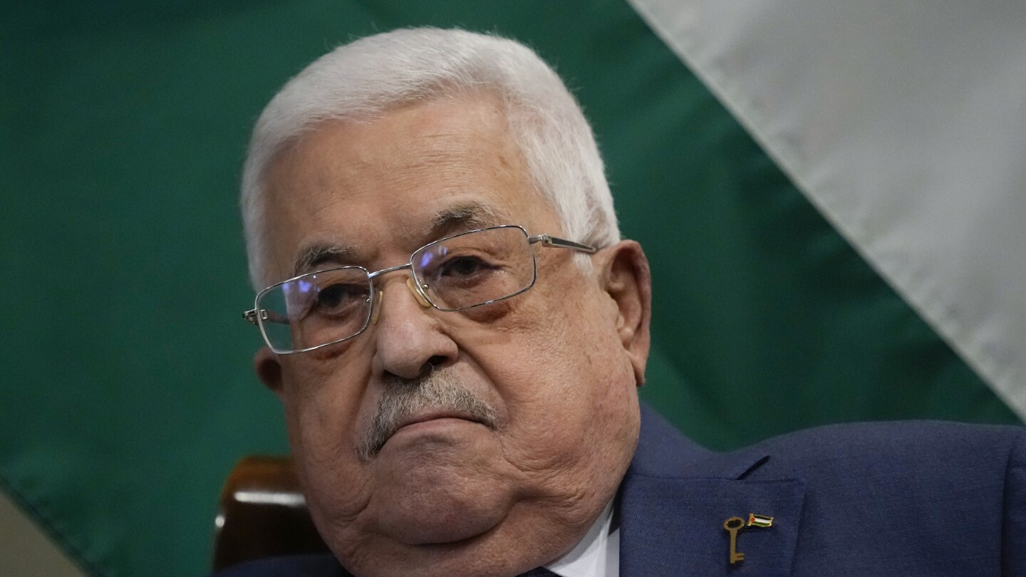 Palestinian leader appoints longtime adviser as prime minister in the face of calls for reform