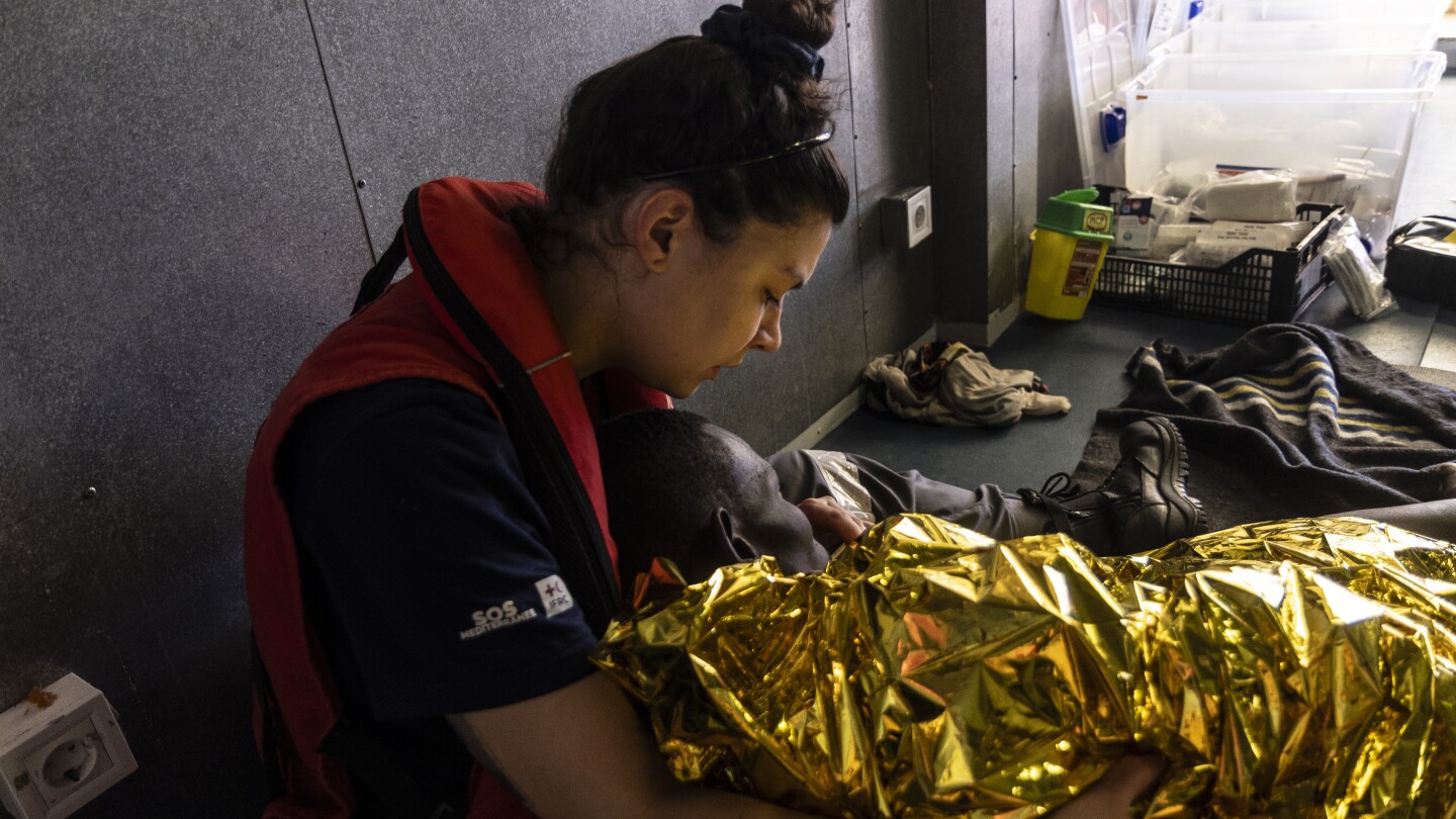 European charity ship rescues 135 migrants but is assigned to distant port in Italy with 359 aboard