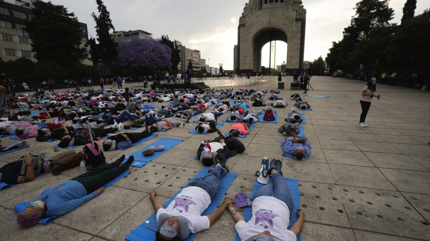 Hundreds of people in Mexico City stretch out for a ‘mass nap’ to commemorate World Sleep Day