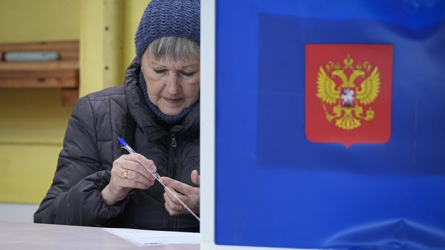 Russians cast ballots on Day 2 of an election preordained to extend Putin’s rule