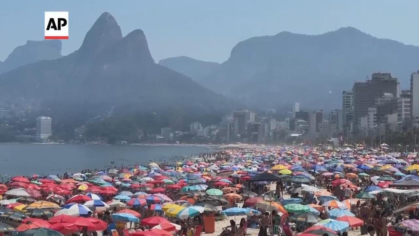 Brazil issues health warning as most of the country swelters in above-average temperatures | AP News