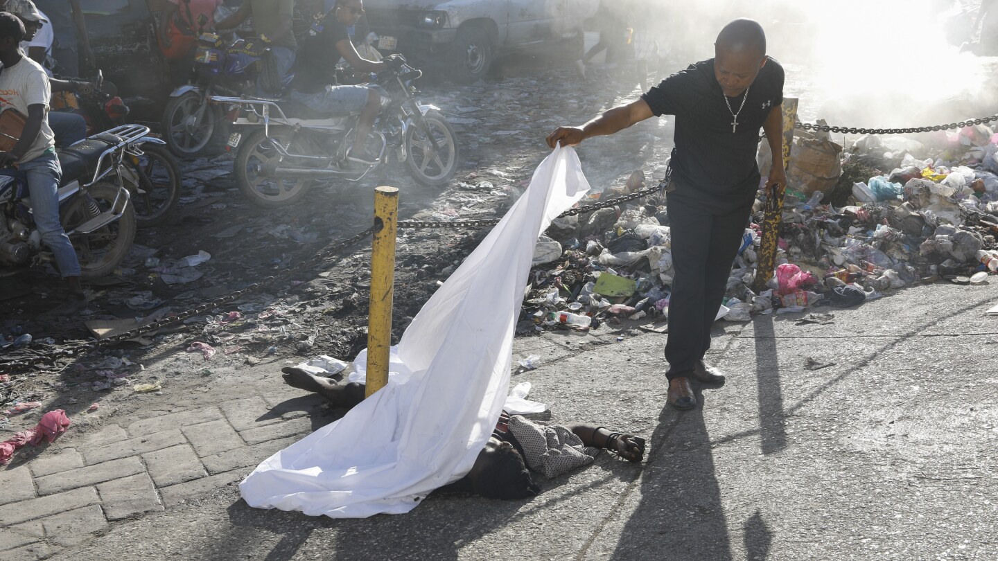 Gangs unleash new attacks on upscale areas in Haiti’s capital, with at least a dozen killed nearby