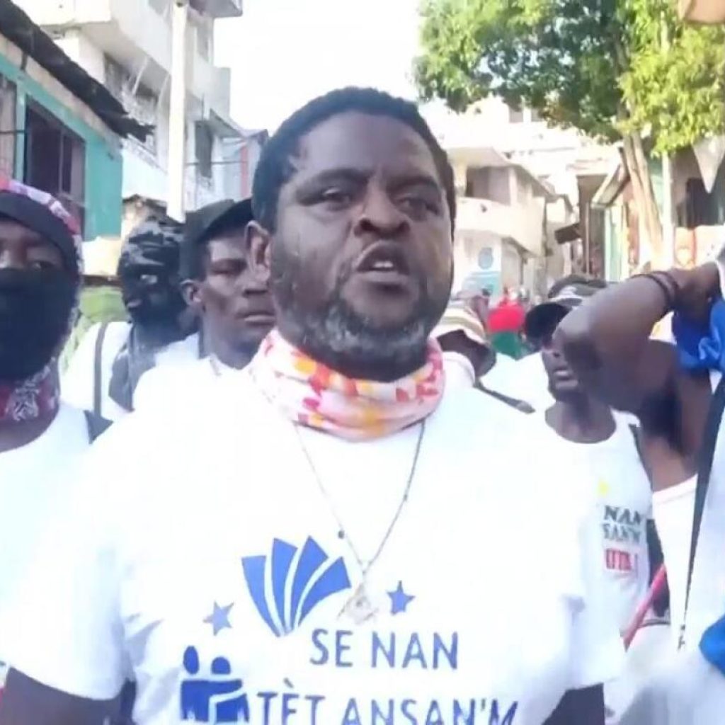 Haitian gang leader calls for a march to national palace in defiance of state of emergency | AP News