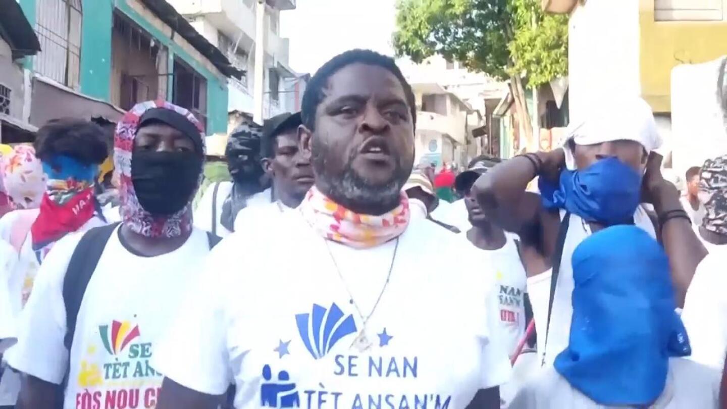 Haitian gang leader calls for a march to national palace in defiance of state of emergency | AP News