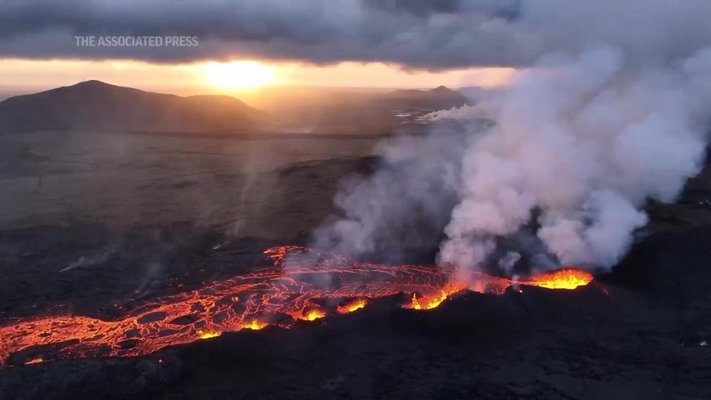 Lava spews from volcanic fissure in Iceland’s southwest | AP News