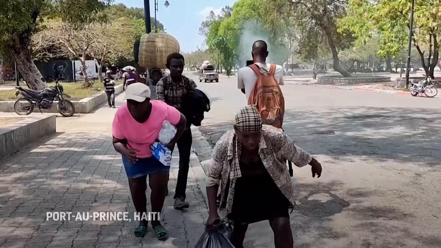 People run as bullets whizz overhead in another gang attack in Haiti | AP News