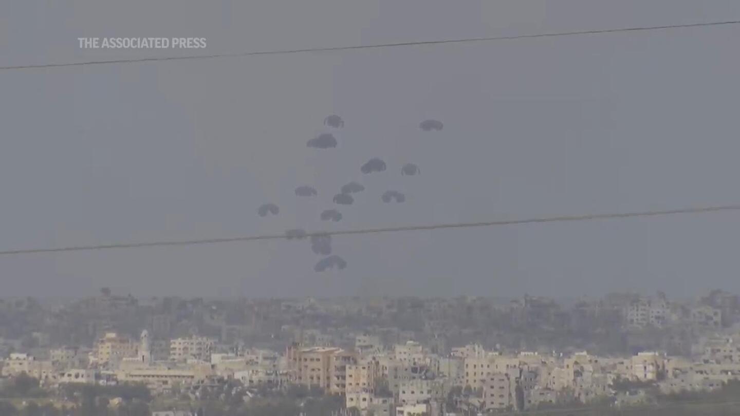 Air drops of aid parachuted into Gaza Strip | AP News