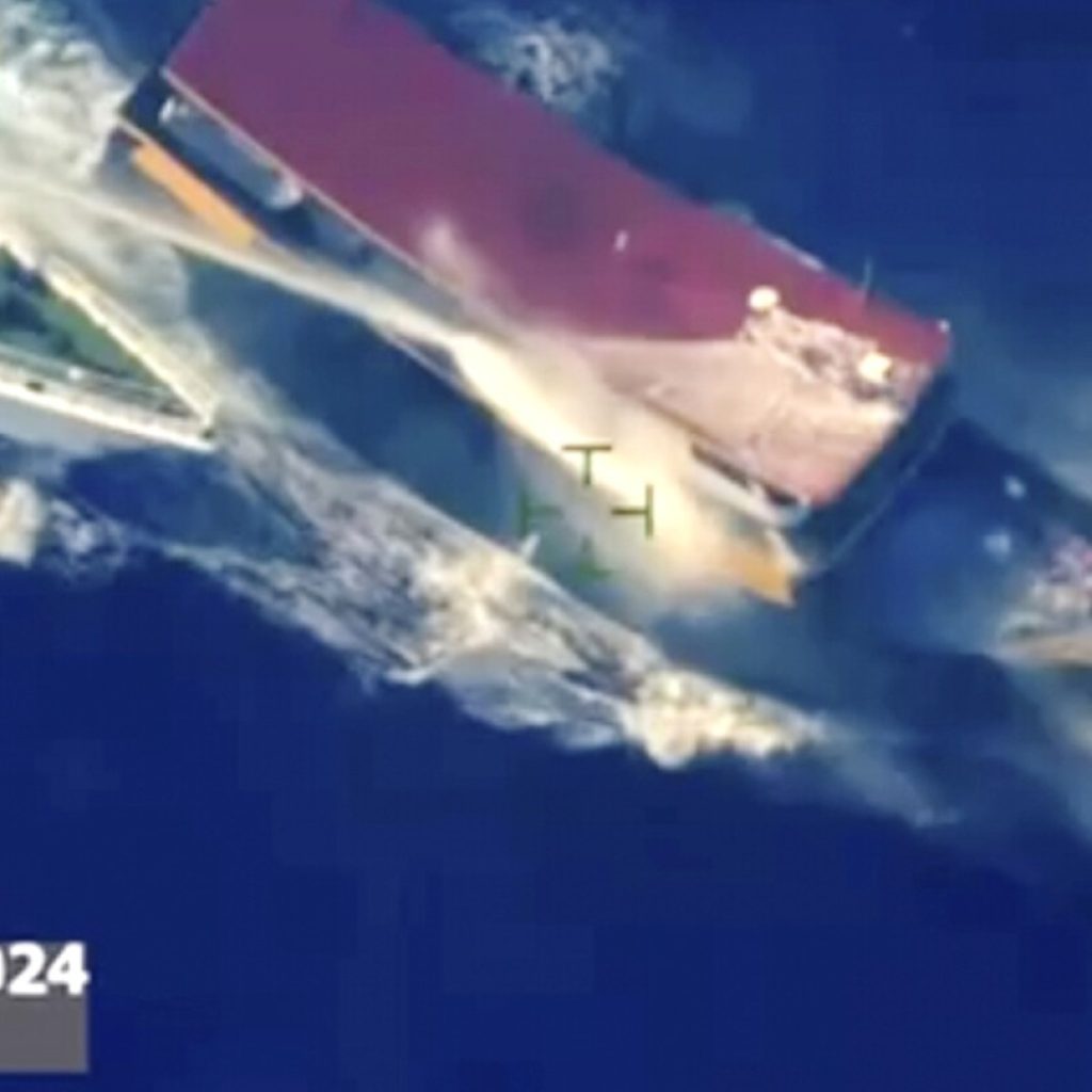 Chinese coast guard blasts Philippine boat with water cannon in disputed sea for 2nd time this month