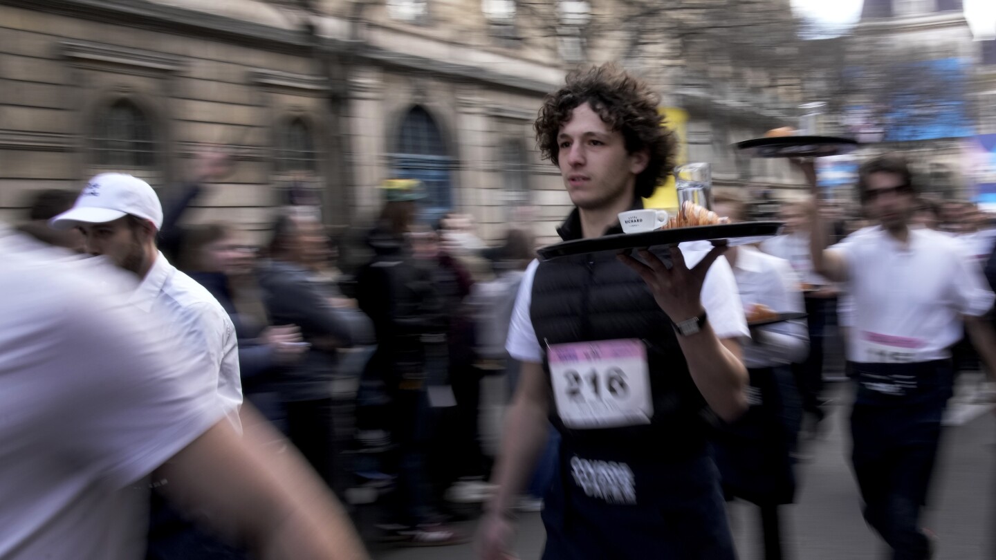 Olympics taster: Paris race celebrates the waiters and waitresses who nourish city’s life and soul