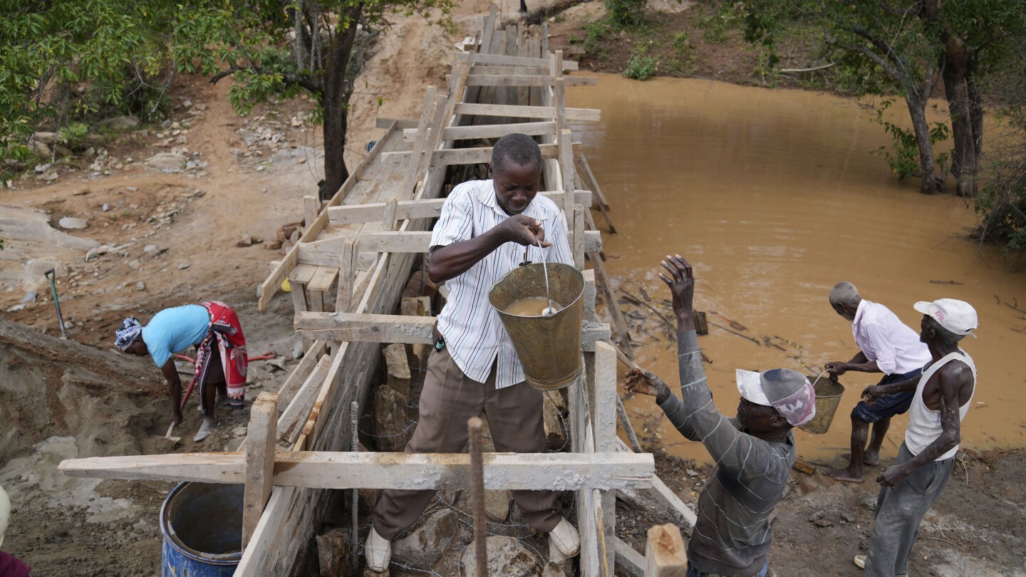 To make water last year-round, Kenyans in dry regions are building sand dams on seasonal rivers