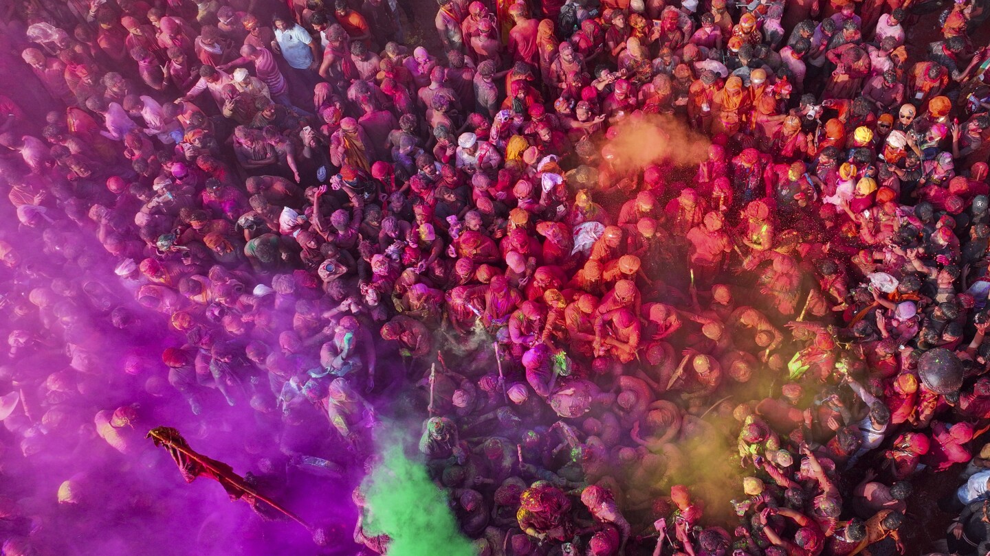 AP Photos: India celebrates Holi, the Hindu festival of color, marking the reawakening of spring