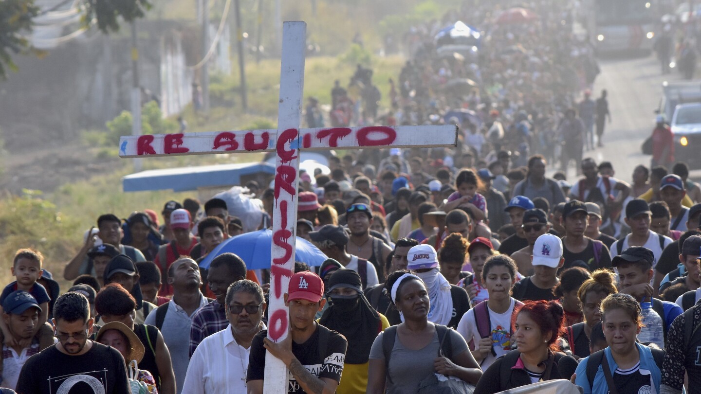 About 2,000 migrants begin a Holy Week walk in southern Mexico to raise awareness of their plight