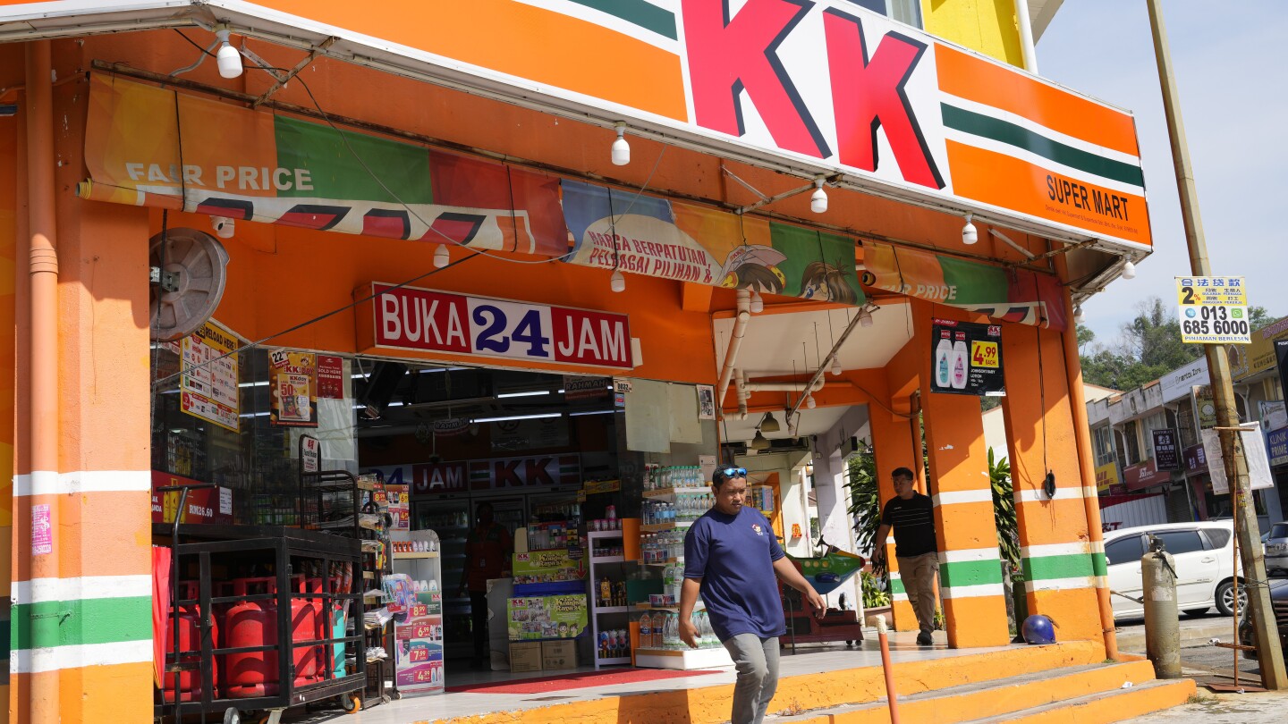 Malaysian convenience store owners charged over ‘Allah’ socks that angered Muslims