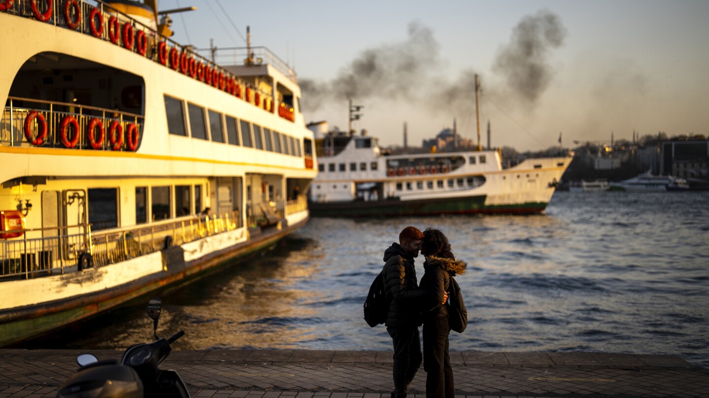 AP PHOTOS: Voters to turn a new page in the history of Istanbul, guardian of the Bosphorus