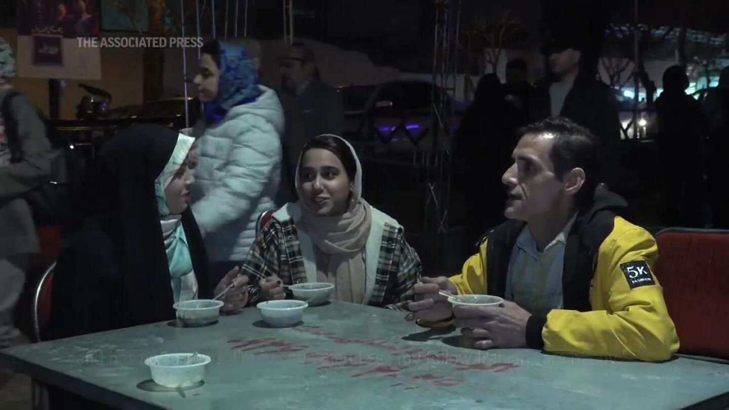 Tehran residents enjoy free Iftar meals for Ramadan | AP News