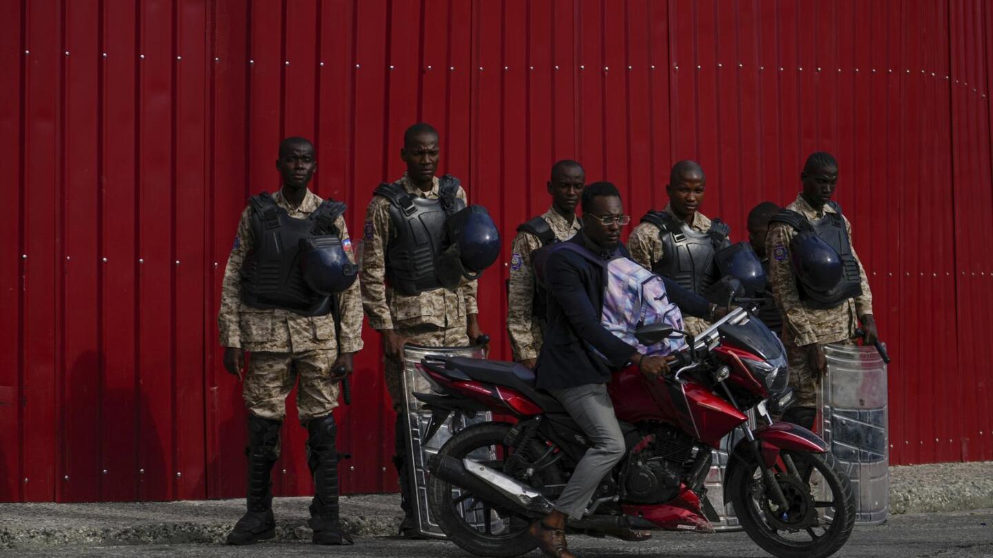 Haiti’s Henry resigns as prime minister, making way for a new government