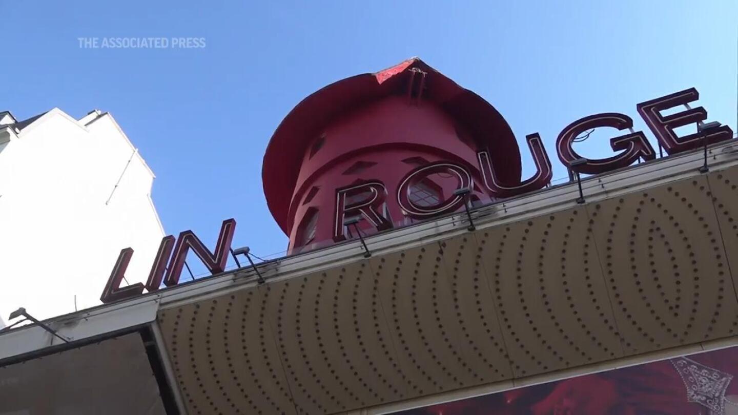 Windmill atop Paris’ famous 19th century Moulin Rouge cabaret falls from roof