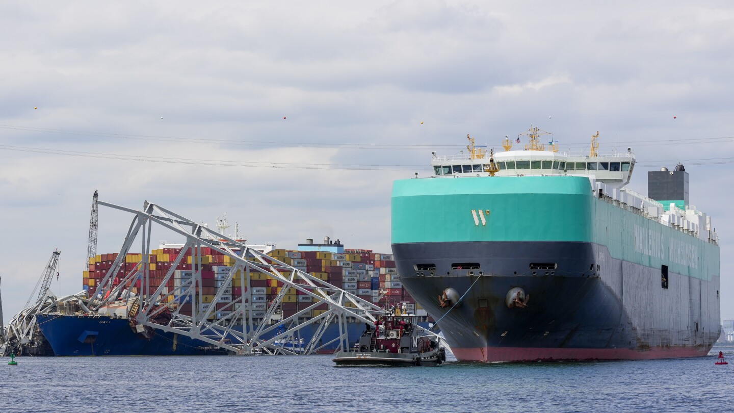 First cargo ship passes through newly opened channel in Baltimore