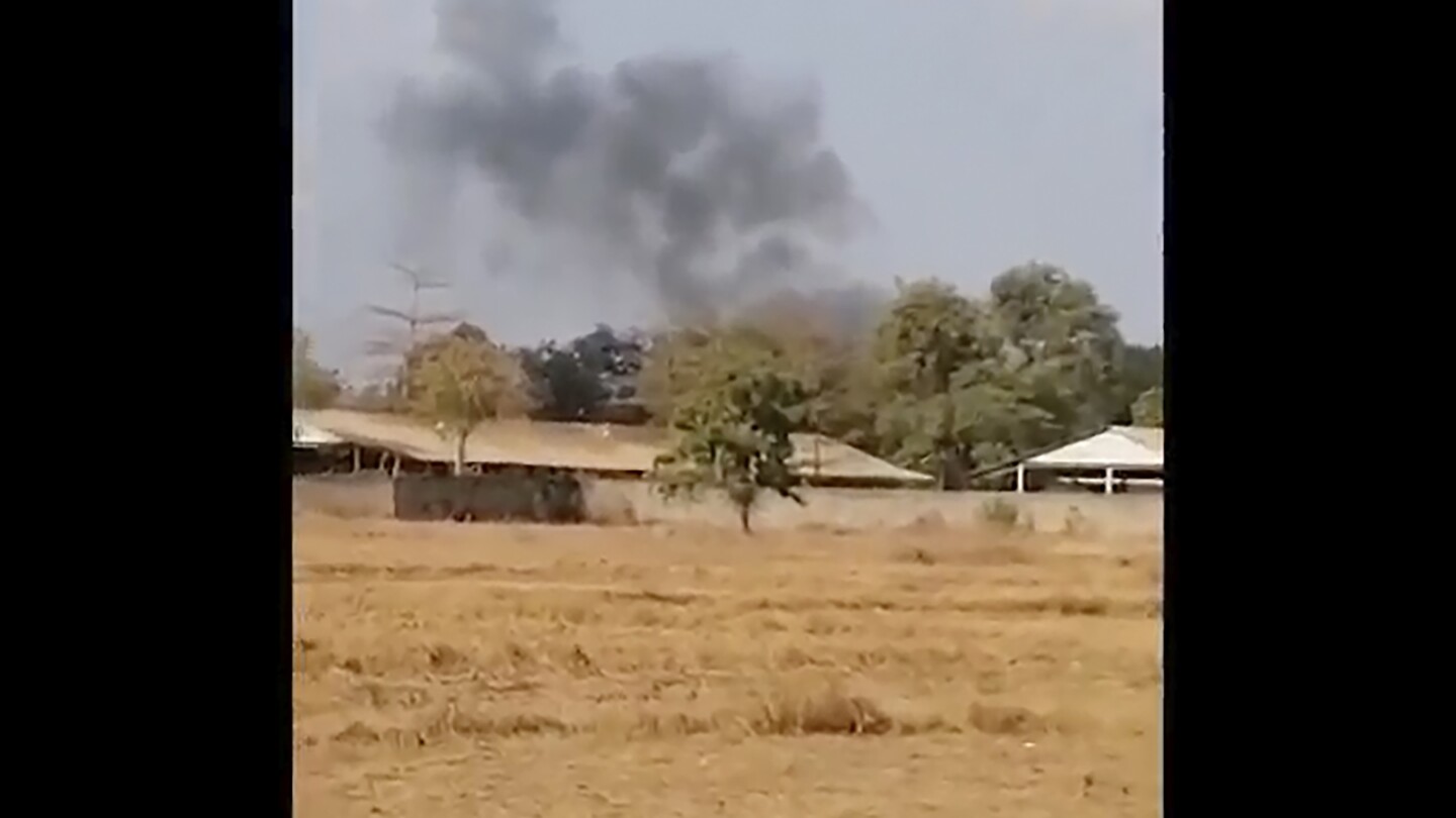 A munitions explosion at a Cambodian army base kills 20 soldiers, but its cause is unclear